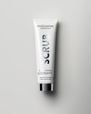 MÁDARA Organic Skincare exfoliating oil to milk scrub A2151 face oil product photo on plain background.